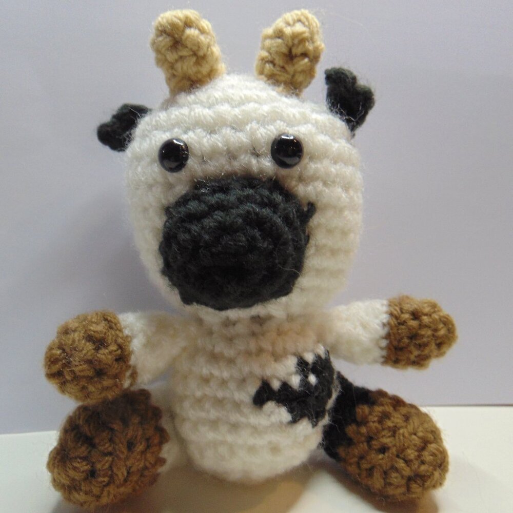 Baby Black and White Cow
